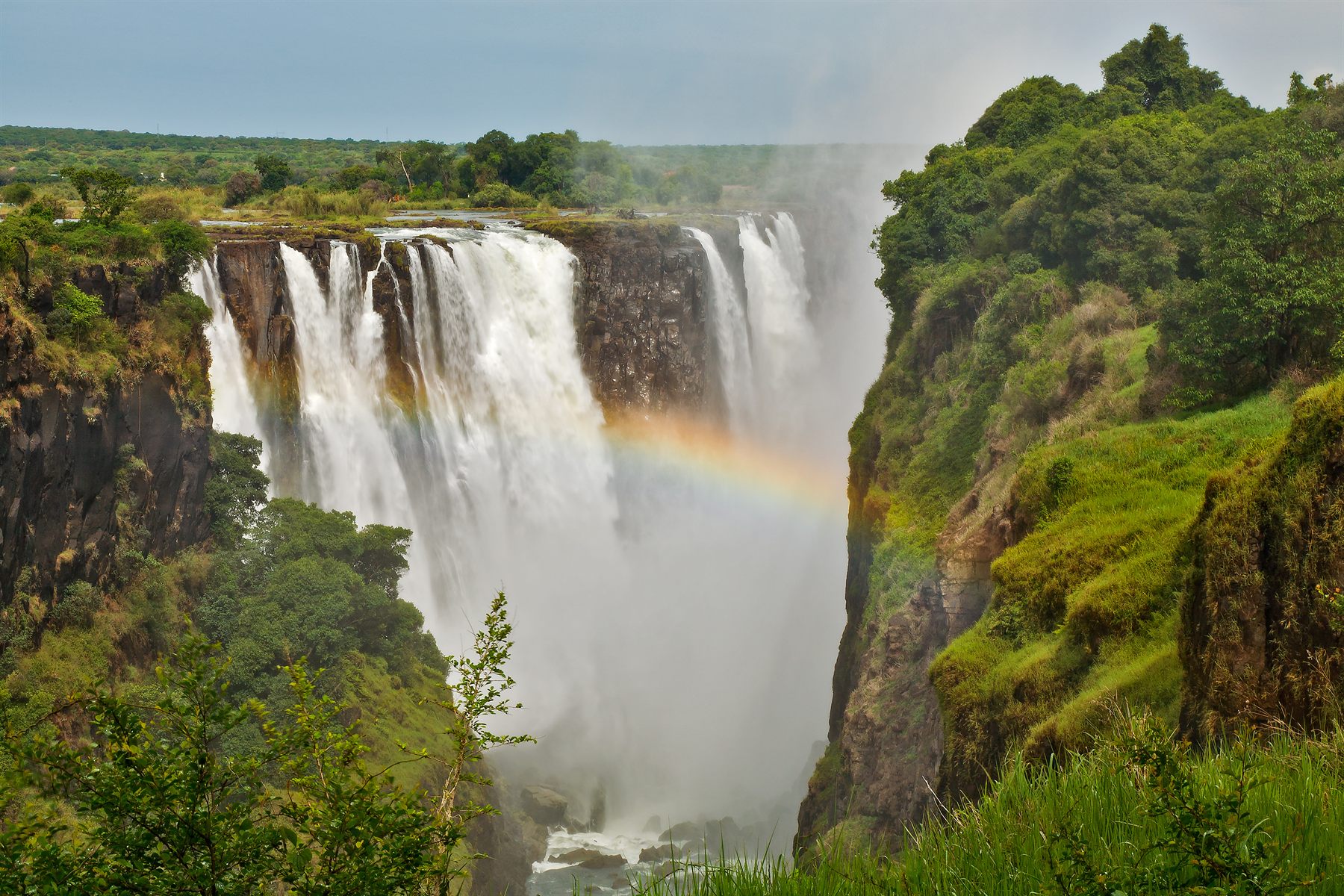 Victoria Falls with a rainbow, an hour from the Chobe